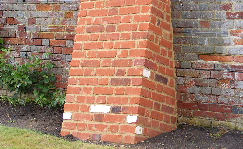 Buttress built in Flemish bond using lime mortar